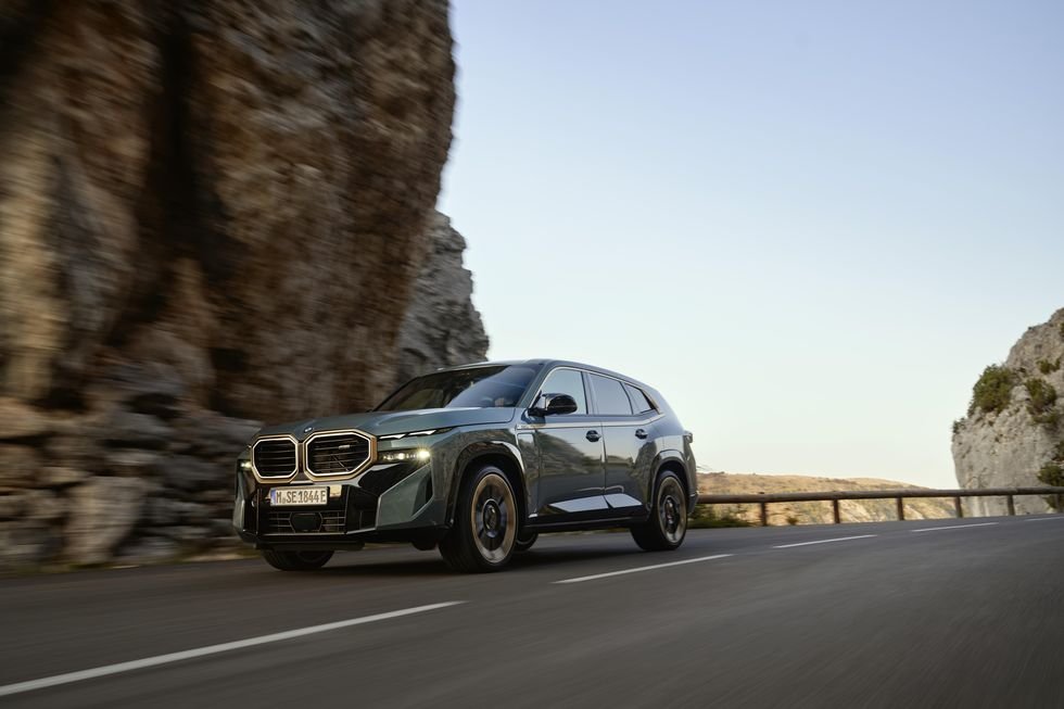 2023-bmw-xm-front-three-quarters-in-motion-1664208744.jpg